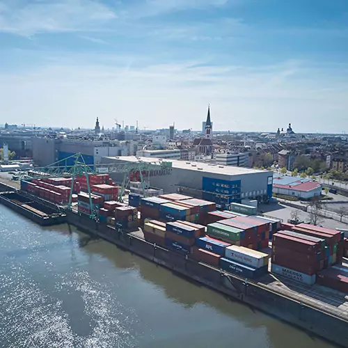 Arial photo of a cargo ship docked at a harbor