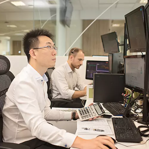 Working man sitting behind the computer