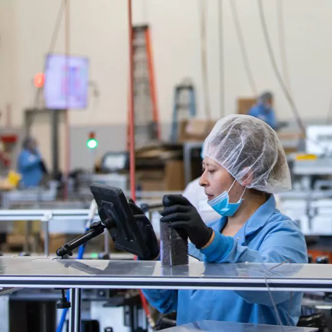 Worker operating a machine