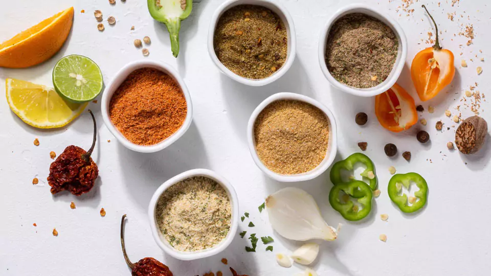 Above shot of styled ofi spices decorated with fruits