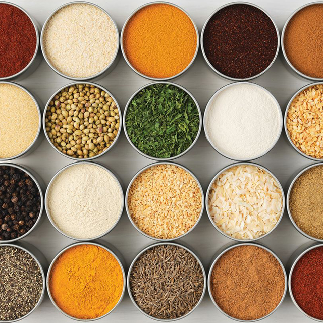 Various spices in small bowls