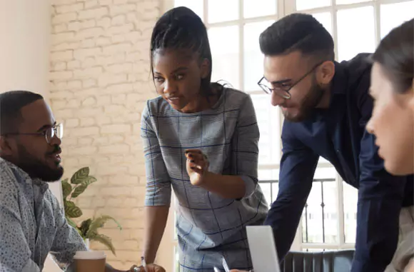 Two colleagues standing and having a conversation